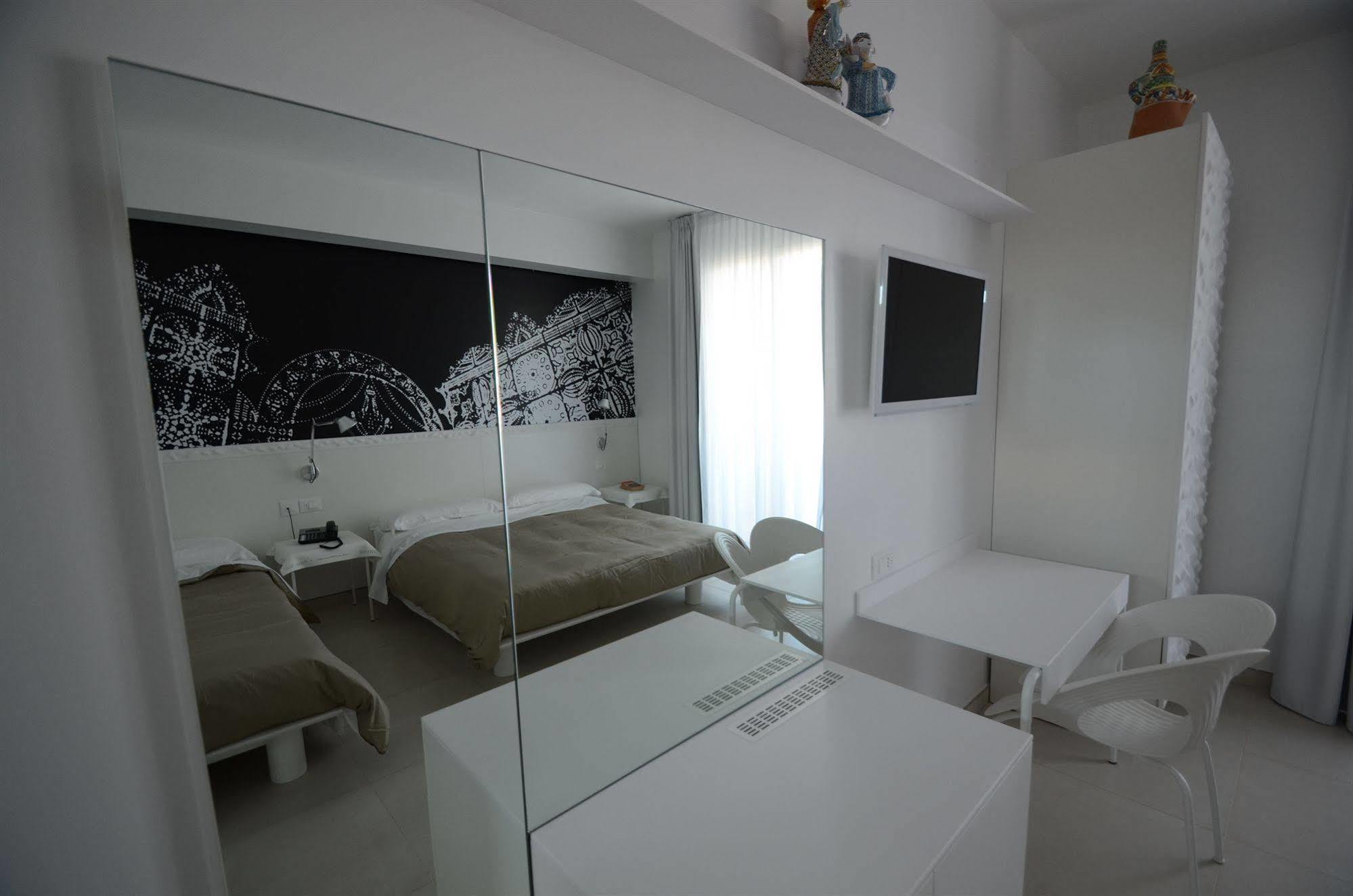 Quihotel بورتو سيساريو المظهر الخارجي الصورة